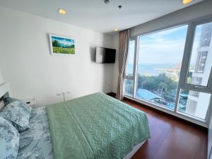 The Palm Wongamat - 2BR Luxury Beachfront Suite - Ocean View