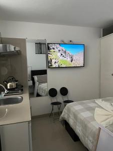 Albano Habitación con cocina y baño