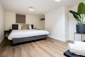 Deluxe Quadruple Room room in HOLT Hotel