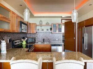 Oceanfront Gem with Pools & Private Beach #704