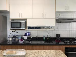 Apartamento nas Astúria em frente da praia