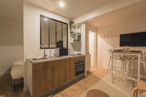 Appartements Oscaria, centre Reims, plein pied : photos des chambres