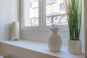 Appartements Oscaria, centre Reims, plein pied : photos des chambres