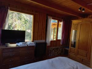 Cabaña La Confluencia, a metros del Río Quemquemtreu y del Río Azul