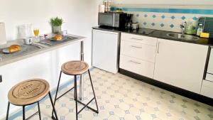 Appartements VOYAGE AU CALME a 10 Minutes du centre avec PARKING INCLUS et FIBRE, IDEAL SOLO et PRO : photos des chambres