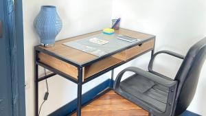 Appartements VOYAGE AU CALME a 10 Minutes du centre avec PARKING INCLUS et FIBRE, IDEAL SOLO et PRO : photos des chambres