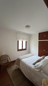 Apartamento en 1ª línea de Playa Silgar con vistas al mar y parking privado