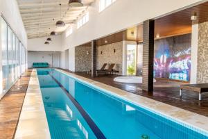 Casa 4 Suites Garopaba, Rosa Internacional - Surfland