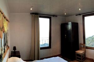 Appartements House between the sea and the mountain : photos des chambres