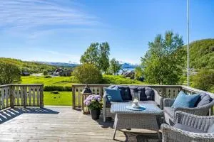 Serene Countryside Holiday Home with Fjord Views and blooming Gardens - Storjord