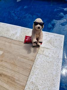 Suíte em casa familiar da Mirian com vista piscina