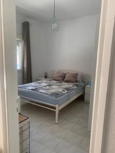 Gemütliche drei Zimmer Erdgeschosswohnung mit Wohnküche und Balkon