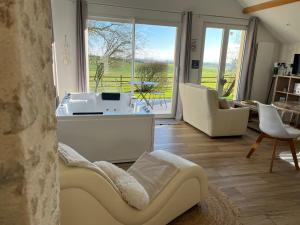 Maisons de vacances Gites & SPA du bien-etre - Logement cosy a la campagne - ACCES SPA EN SUPPLEMENT : photos des chambres