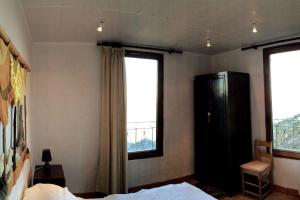 Appartements House between the sea and the mountain : photos des chambres