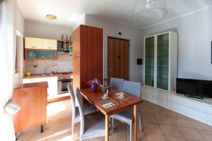 Casa Verina - Balconi colorati - Quattromiglia