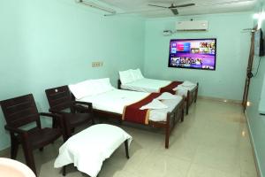 Dhasaiyan Tourist Home