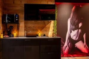 Appartements Love Room Tentation : photos des chambres