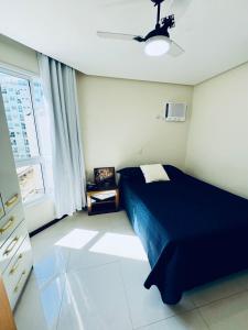 Apartamento frente mar na Praia do Morro - 3 quartos com 1 suíte, ar condicionado e enxoval premium