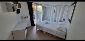 Appartements loft de standing 150 m2 vue mer,de 2 a 6 pers a Mare e Sole Plage d'argent Verghia : photos des chambres