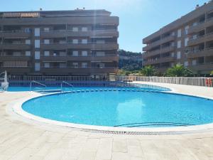 Moderno apartamento centrico con piscina y parking
