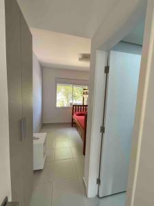 Casa Pé na Areia Boiçucanga