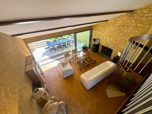 Maisons de vacances BEYTAN AL COUDER Stylish architect house with AC and private pool, village center, golf course and Dordogne river at easy walk : photos des chambres