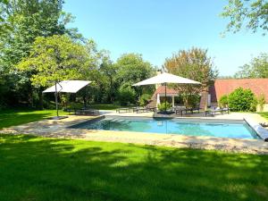 Maisons de vacances BEYTAN AL COUDER Stylish architect house with AC and private pool, village center, golf course and Dordogne river at easy walk : photos des chambres