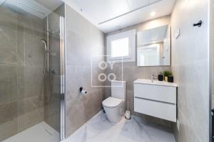 Infinity Blue groundfloor apt, beachfront, heated pool - by OYOOSTAYS