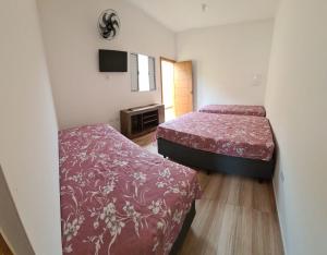 Casa com piscina 5 minutos Á PÉ do mar ,ar condicionado, smart tv praia Martim de Sá