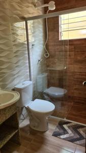 Casa com piscina 5 minutos Á PÉ do mar ,ar condicionado, smart tv praia Martim de Sá