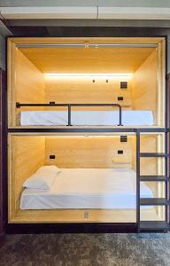 Female Capsule room in The Capsule Hotel