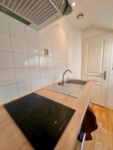 Appartements Appartement Cosy avec Netflix et parking gratuit : photos des chambres