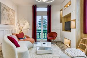 Appartements Rose ecrin de charme avec parking terrasse privee et jardin partage : photos des chambres