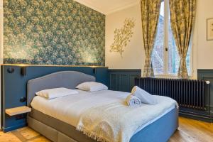 Appartements Rose ecrin de charme avec parking terrasse privee et jardin partage : photos des chambres