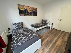 Möblierte Wohnung mit ruhiger Terrasse in bester Lage für Feriengäste und beruflich Reisende AW12A-I