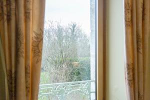 B&B / Chambres d'hotes Les logis de Kergoulou : photos des chambres