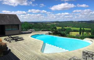 Maisons de vacances Les maisons d-en haut & Piscine a debordement chauffee : photos des chambres