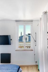 Appartements Experience loft a 2 pas du front de mer : photos des chambres