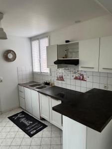 Appartements Studio cosy Paris La Defense Arena : photos des chambres