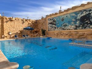 Beautiful 3-Bedroom Apartment on the Ground Floor with Personal Backyard Area and Terrace with Direct Pool Access and Pool View