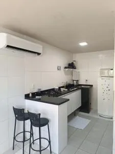 Quitinete com AR próximo à Sulanca e Assaí - 卡鲁阿鲁