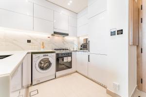 City Views 1BR with Private Balcony, Binghatti House, Jumeirah Village Circle by Deluxe Holiday Homes