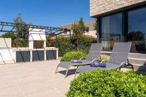 Villa Anni for 10 people in Porec with heated pool, sea view & kids room and playground