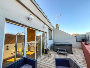 Maisons de vacances Le B Maison 1 a 4 pers & jacuzzi a Baccarat : photos des chambres
