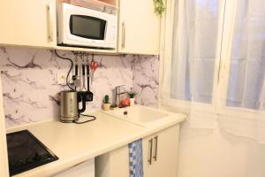 Maisonette 2 min du RER B free parking