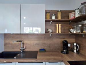 Appartements La Ciccia - appartement cosy de plain-pied, avec jardin, terrasse et garage prive - By AURAconcergerie : photos des chambres