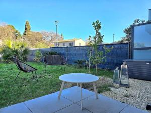 Appartements La Ciccia - appartement cosy de plain-pied, avec jardin, terrasse et garage prive - By AURAconcergerie : photos des chambres