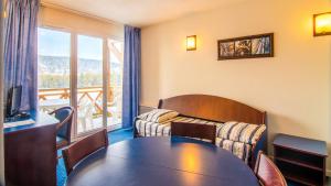 Appart'hotels Vacanceole - Appart'Vacances Pyrenees 2000 : photos des chambres