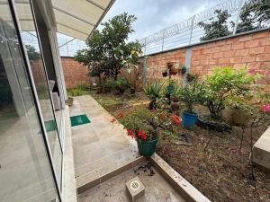 Casa tranquila con jardín en Mocoa