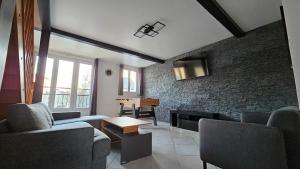 Appartements Grey And White Duplex : photos des chambres